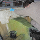 Constructing a rear seating area out of fresh fiberglass.